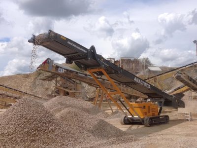 Anaconda TR60 tracked conveyor discharging gravel onto a pile at a quarry